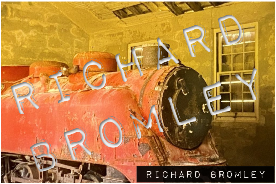 Vincent Astors abandoned locomotive rusts away in it's train depot - Bermuda 1978
